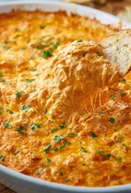 Delicious Buffalo Chicken Dip served in a bowl with tortilla chips