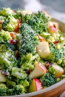 A vibrant Apple Broccoli Salad with fresh apples and broccoli in a bowl