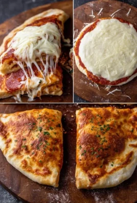 Homemade calzone filled with cheese and vegetables on a baking tray.