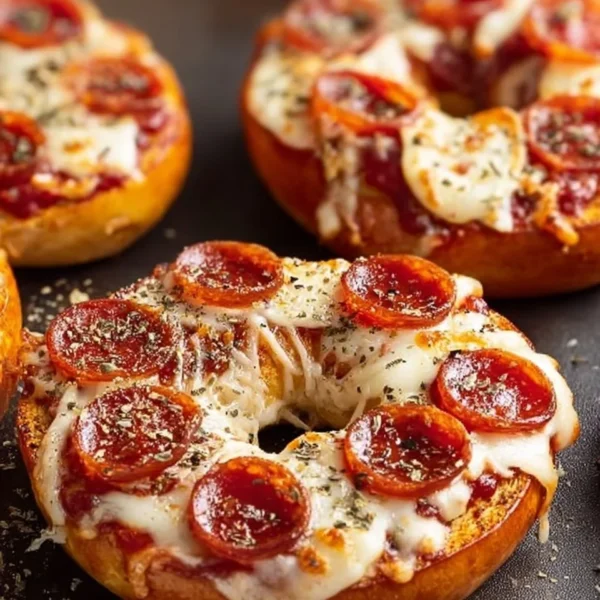 Delicious easy homemade pizza bagels topped with cheese and pepperoni