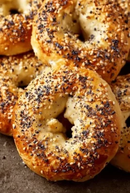 Freshly baked Greek Yogurt Bagels topped with sesame seeds.