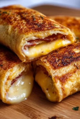 Delicious grilled cheese roll ups served with dipping sauce.