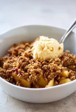 Healthy breakfast apple crumble with oats and fresh apples