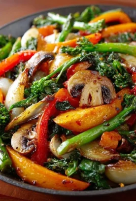 Colorful sautéed vegetables in a skillet, a healthy and delicious side dish