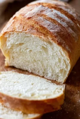 Delicious slices of homemade bread on a wooden cutting board