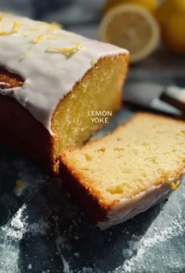 Lemon Yogurt Cake topped with citrus slices and mint leaves
