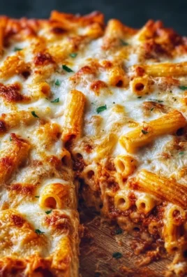 Delicious Million Dollar Baked Ziti topped with melted cheese and herbs