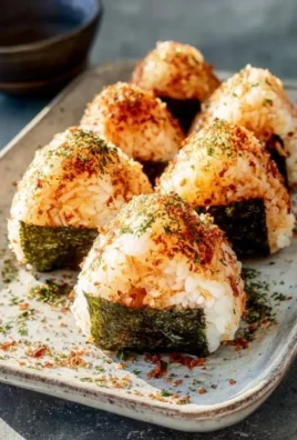 Spicy crab onigiri, Japanese rice balls filling with crab and spices.