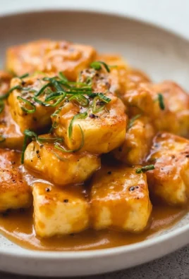 Delicious Vegan Marry Me Tofu served on a plate with colorful veggies