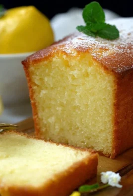Famous Ritz Carlton lemon pound cake recipe from 1920, showcasing its zesty flavor.