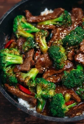 Beef and Broccoli Stir Fry in a colorful bowl with chopsticks