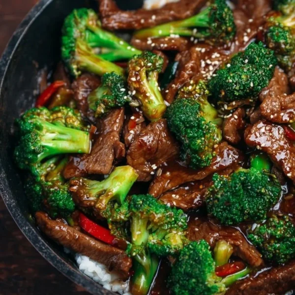 Beef and Broccoli Stir Fry in a colorful bowl with chopsticks