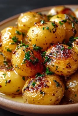 Delicious garlic sauce baby potatoes served on a plate