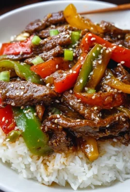 Delicious pepper steak dish served with vegetables and sauce