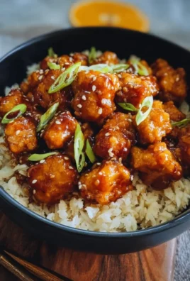 Delicious Vegan Orange Chicken made with tofu served on a plate