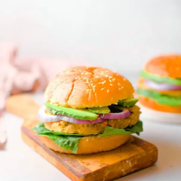 15-Minute chickpea burgers served on a plate with fresh toppings