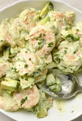 Delicious Avocado Shrimp Salad with fresh vegetables and shrimp in a bowl