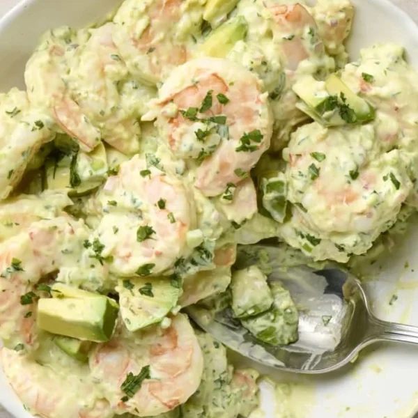 Delicious Avocado Shrimp Salad with fresh vegetables and shrimp in a bowl