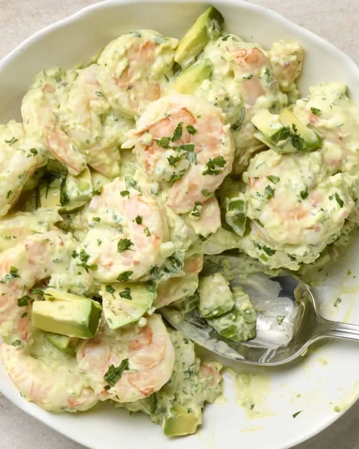 Delicious Avocado Shrimp Salad with fresh vegetables and shrimp in a bowl