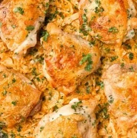 Cabbage Alfredo with Crispy Chicken served on a plate