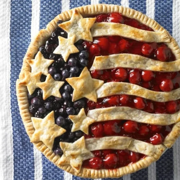 Freshly baked Cherry Blueberry Pie with vibrant berries and a golden crust