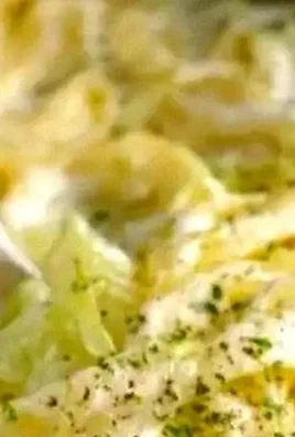 Creamy Alfredo Cabbage Pasta served in a bowl with parsley garnish