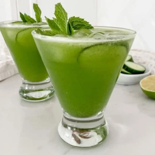Refreshing Cucumber Mint Mocktail served in a glass with mint leaves and cucumber slices