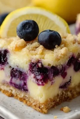 Delicious easy blueberry lemon pie bars with a fresh lemony topping