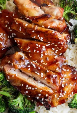 Delicious grilled teriyaki chicken served with rice and veggies