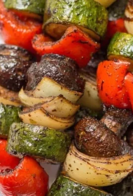 Colorful healthy vegetable kebabs on skewers ready for grilling