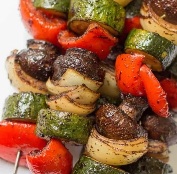Colorful healthy vegetable kebabs on skewers ready for grilling