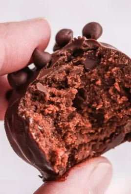 Delicious no-bake brownie bites garnished with chocolate sprinkles