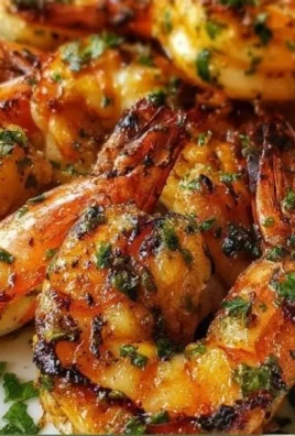 Perfect grilled jumbo shrimp with flavorful marinade on the grill