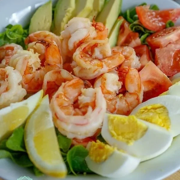 Delicious Shrimp Louie salad with shrimp, avocado, and dressing.