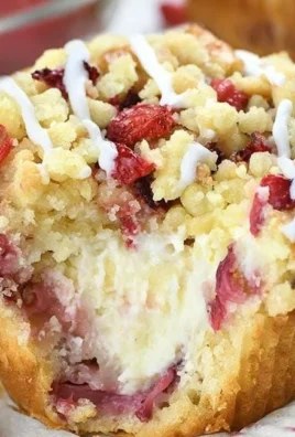 Strawberry Cream Cheese Muffins topped with streusel in a baking dish