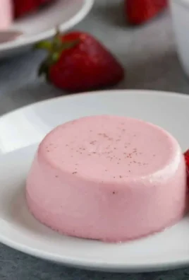 Delicious Strawberry Panna Cotta served in elegant glass dishes