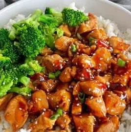Delicious Teriyaki Chicken Rice Bowl with vegetables and savory sauce
