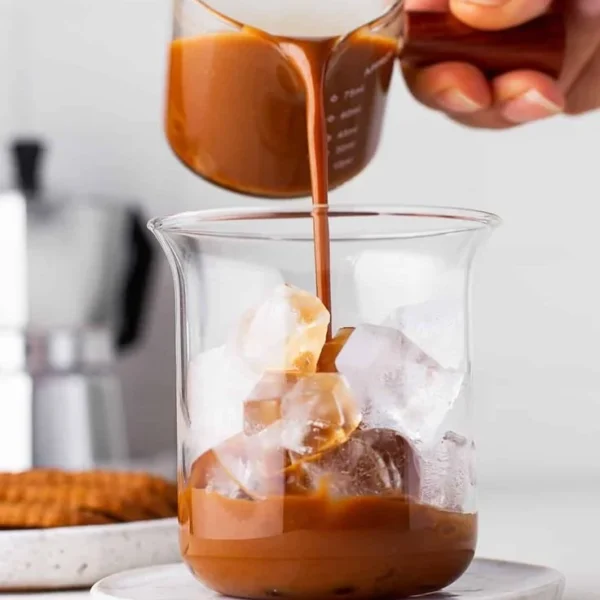 Delicious Cookie Butter Latte with whipped cream and cookie crumbs on top
