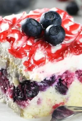Easy summer berry sheet cake topped with fresh strawberries, blueberries, and raspberries