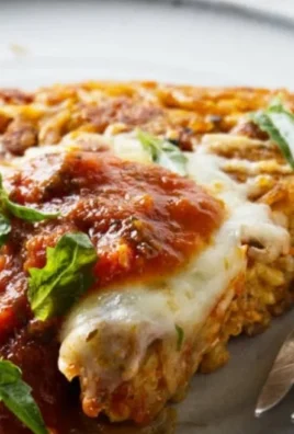 Delicious plate of fried spaghetti garnished with fresh herbs