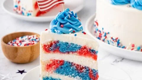 Layered red, white, and blue marble cake with vibrant colors and rich texture